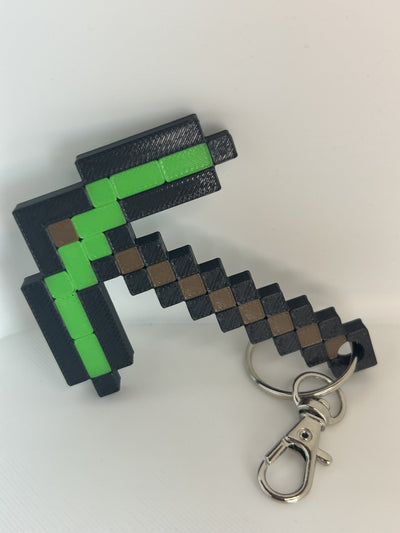 Game pickaxe inspired keychain in green