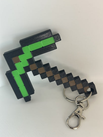 Game pickaxe inspired keychain in green