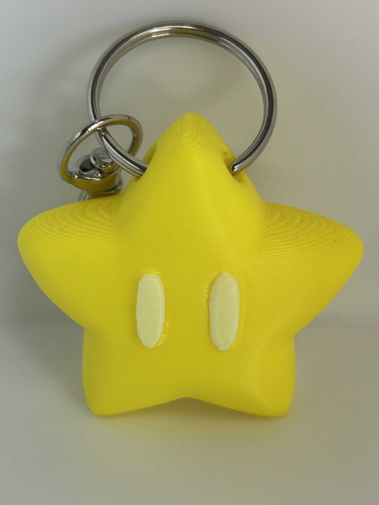Star Shaped Keychain in yellow with white eyes