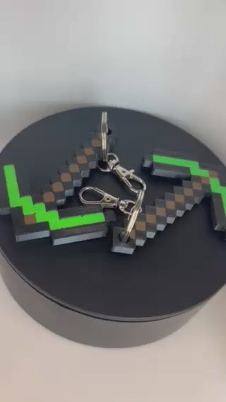 Game pickaxe inspired keychain in green